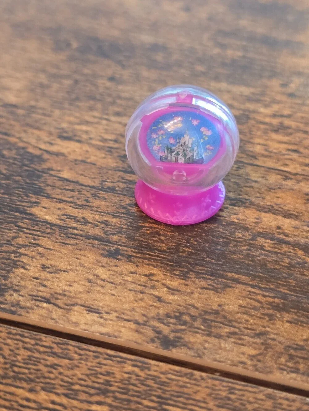 Disney Princess miniature snow globe with a pink base American Girl